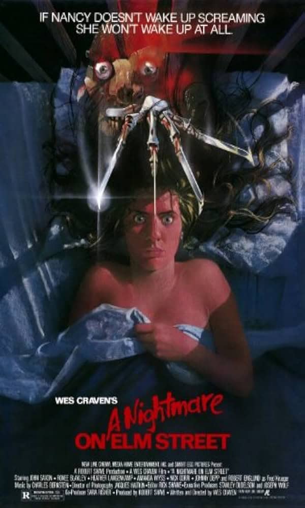 Movie poster for A Nightmare on Elm Street (1984) featuring Nancy in bed with Freddy's claws above her.